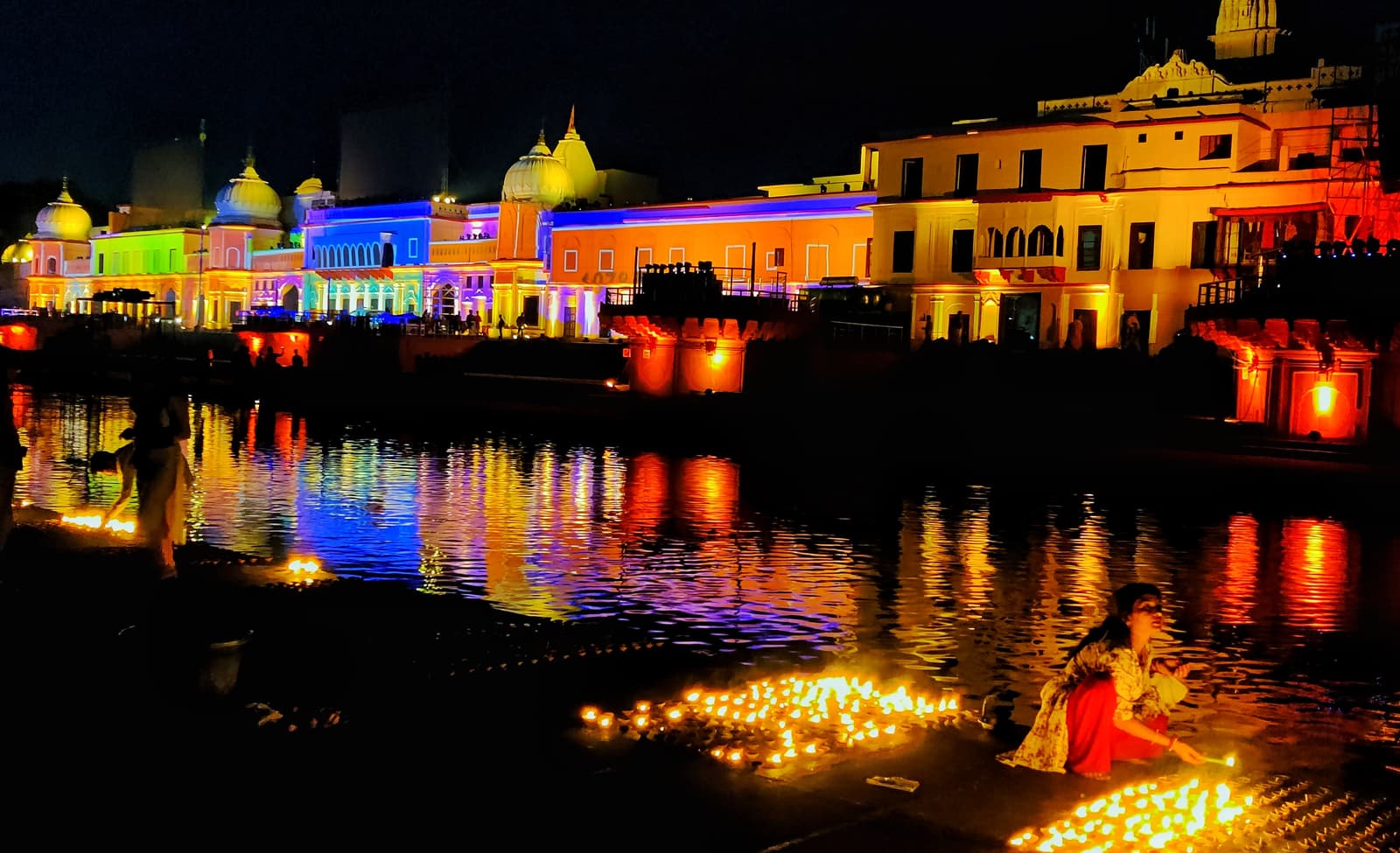 Illuminated ghats and floating oil lamps at Ram ki Paidi during Deepotsav in Ayodhya